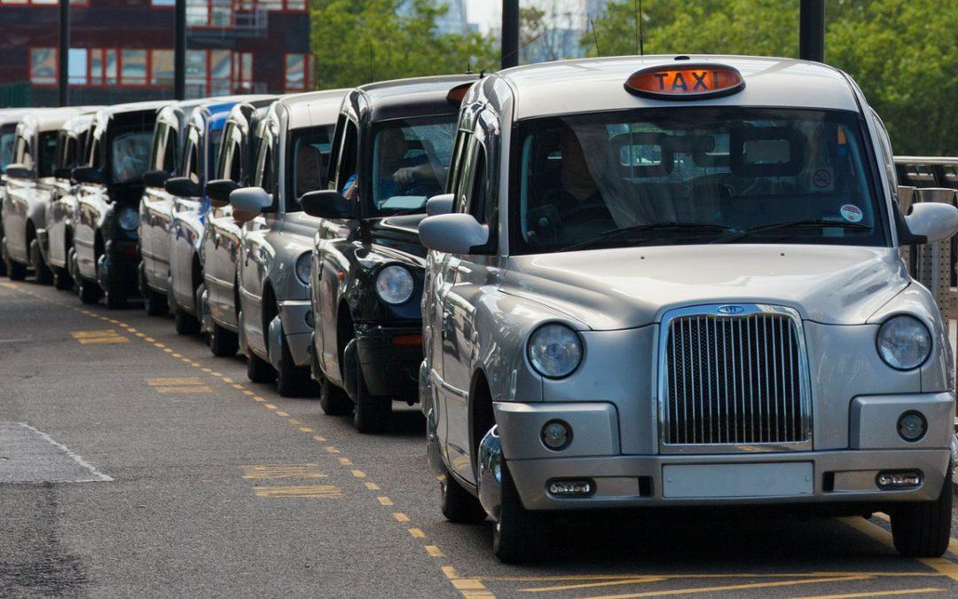 a row of taxi cars